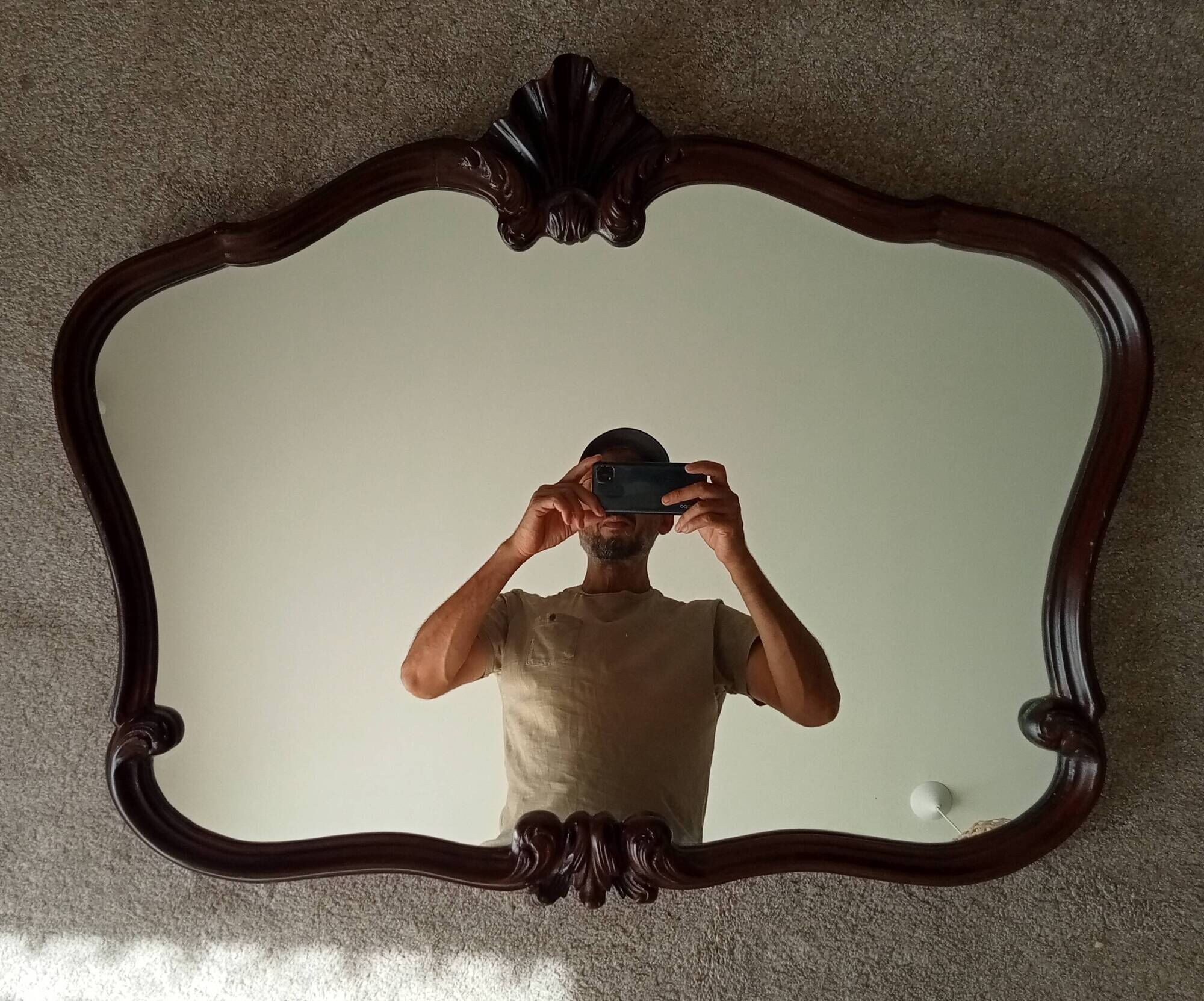 Pair of large antique Rococo style Louis XV mirrors in carved solid wood.