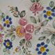 Hand-painted earthenware plate, floral bouquet