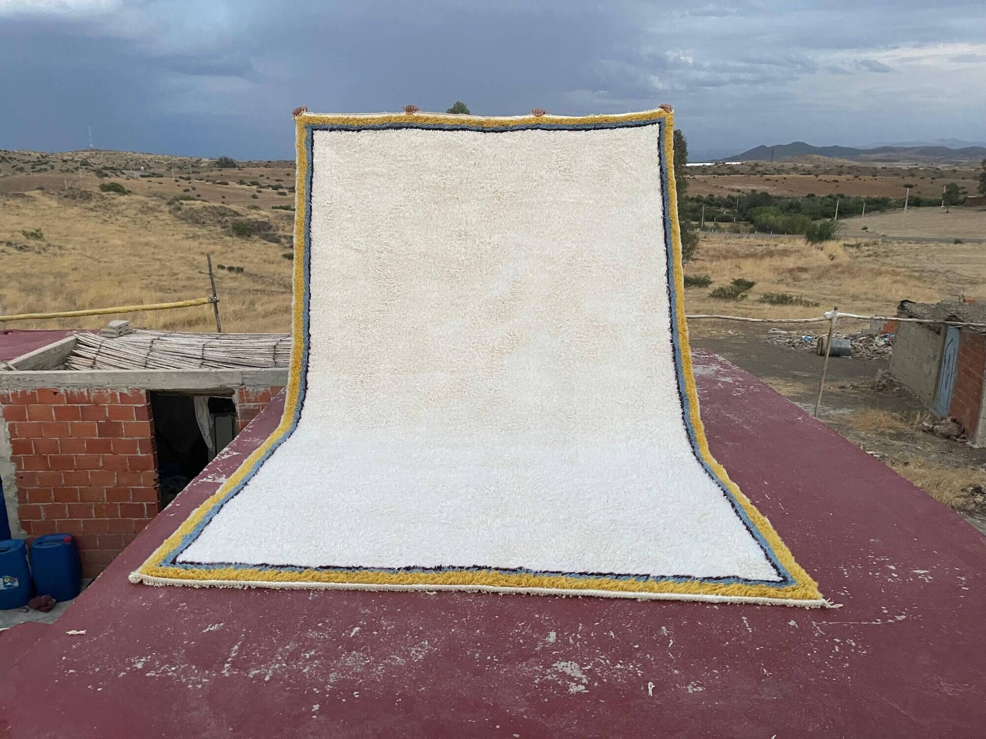Large Moroccan Berber rug in cream 400x250 cm – yellow and blue border