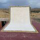 Large Moroccan Berber rug in cream 400x250 cm – yellow and blue border