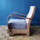 Fauteuil en teck et rotin style colonial