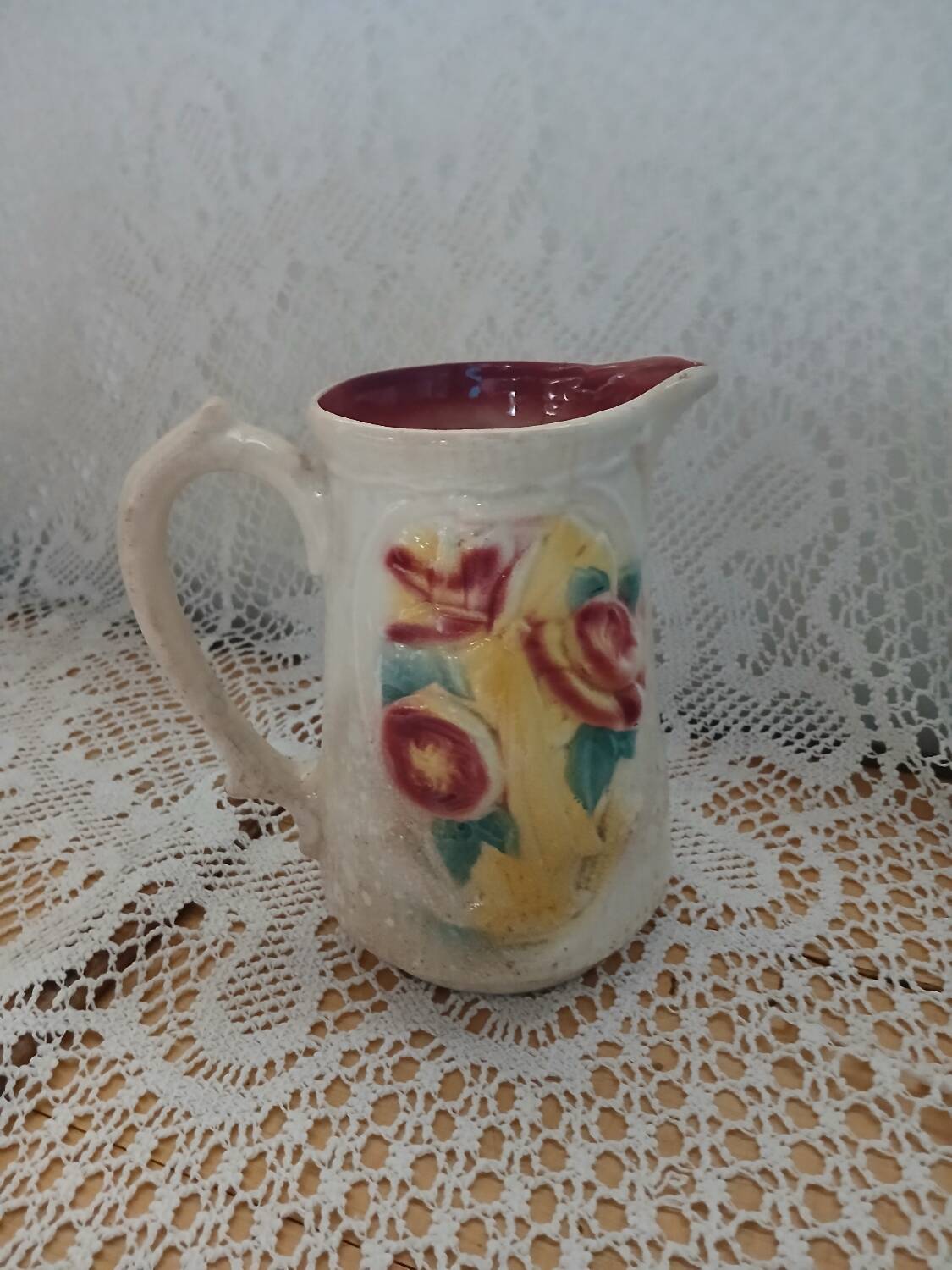 Antique earthenware pitcher