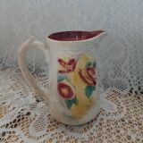 Antique earthenware pitcher