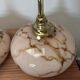 Pair of wall sconces in marbled opaline.