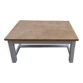 Vintage coffee table with pearl grey legs and a wooden top.