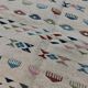 Tapis margoum blanc à motifs berbères multicolores