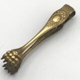 Sugar or ice cube tongs, gold star stamp with lion paw finish