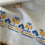 Embroidered white tablecloth