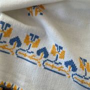 Embroidered white tablecloth