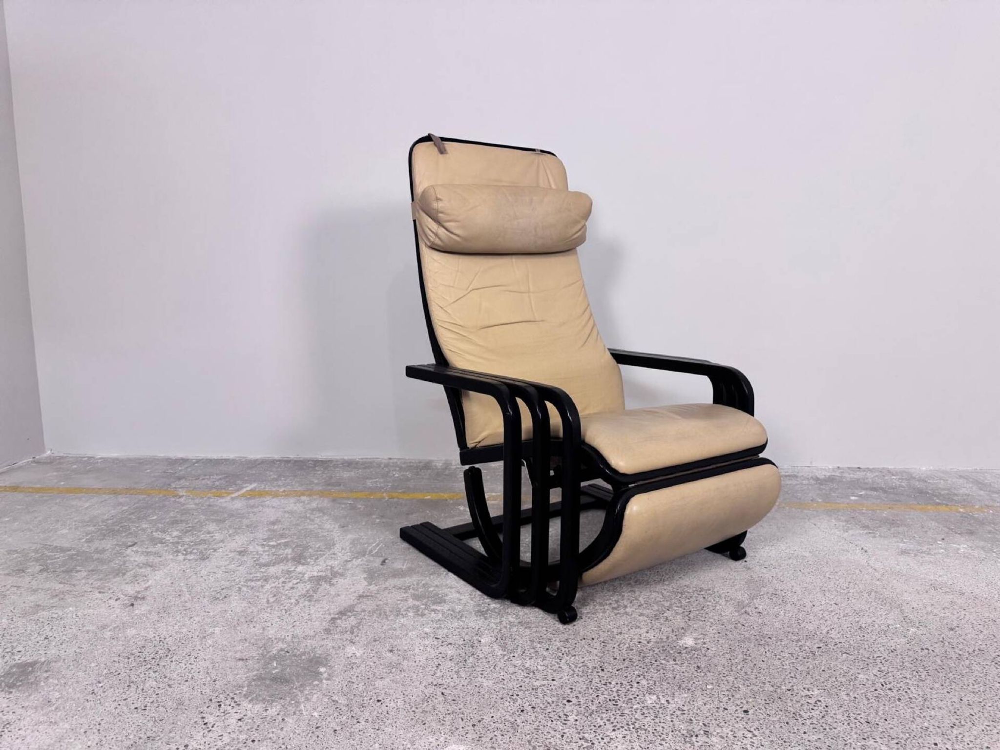 Rocking lounge chair, curved wood, leather, Viennese cane design.