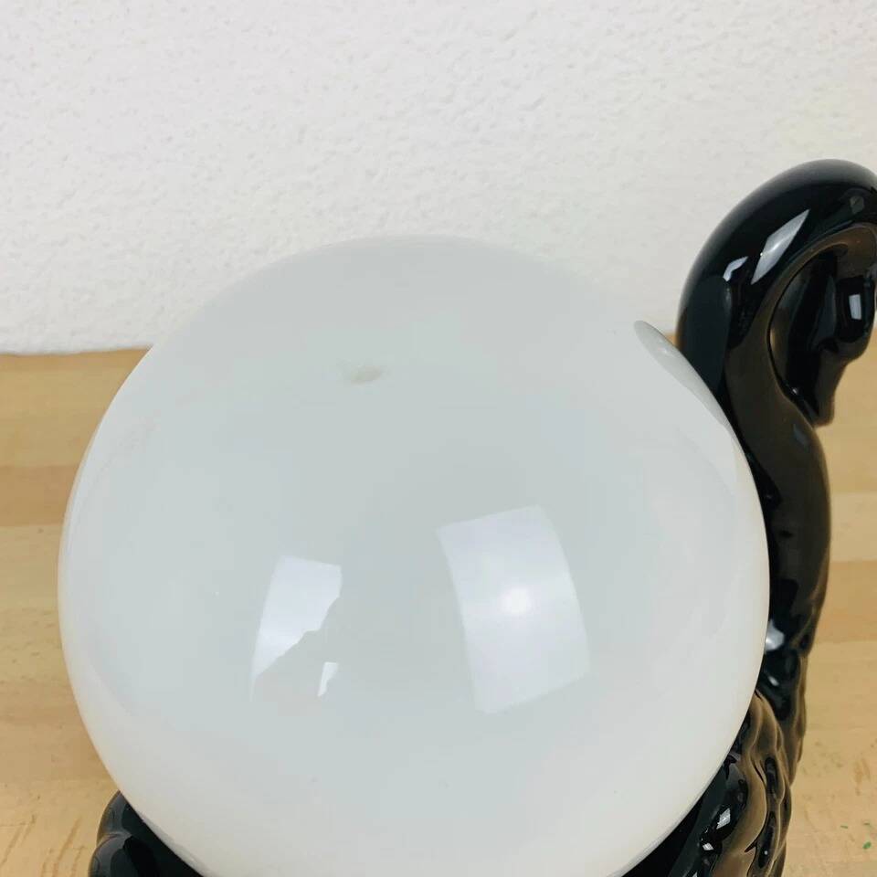 Black ceramic swan lamp with vintage opaline globe
