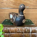 Bird in dark wood, brass & mother-of-pearl