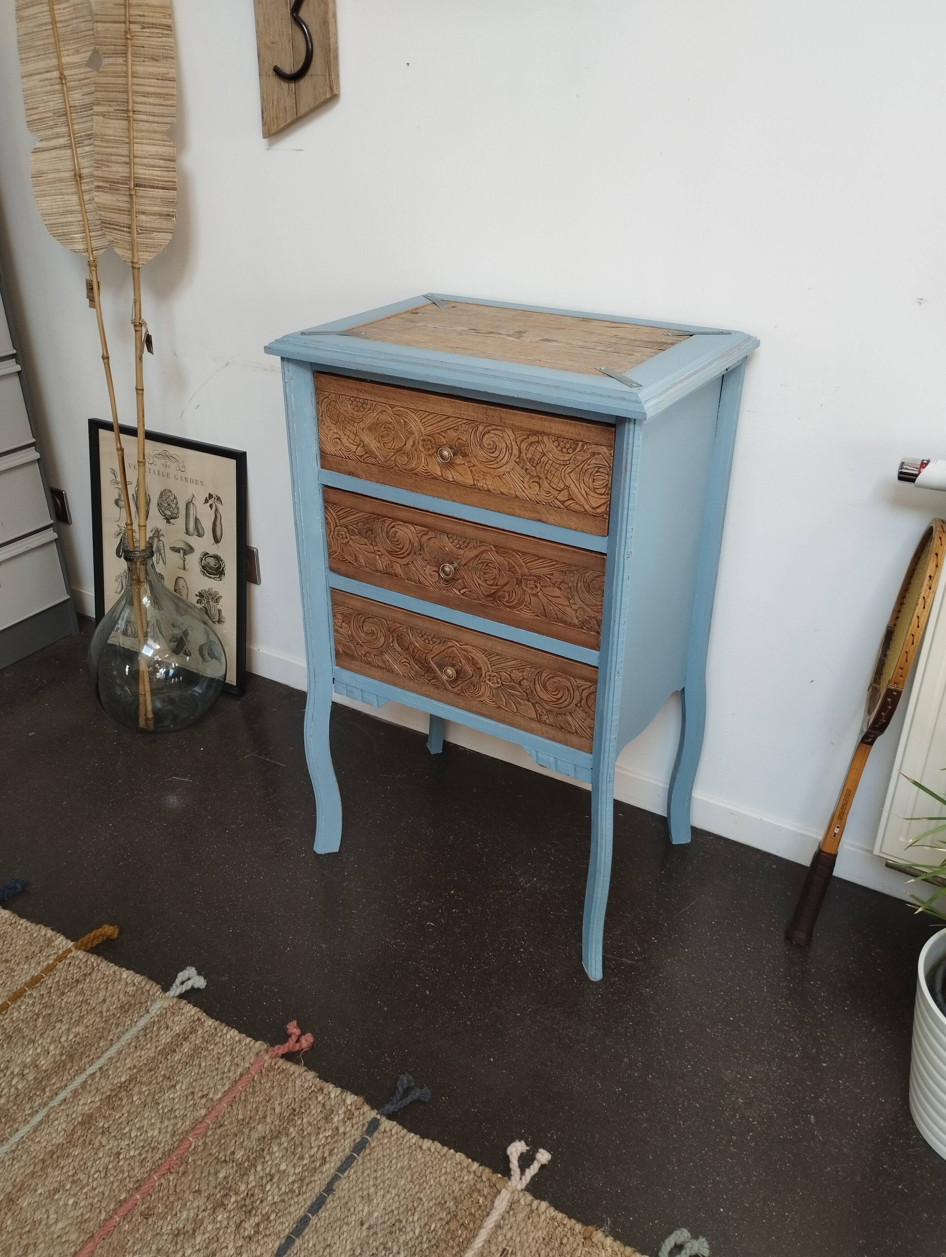 Small carved wood chest of drawers