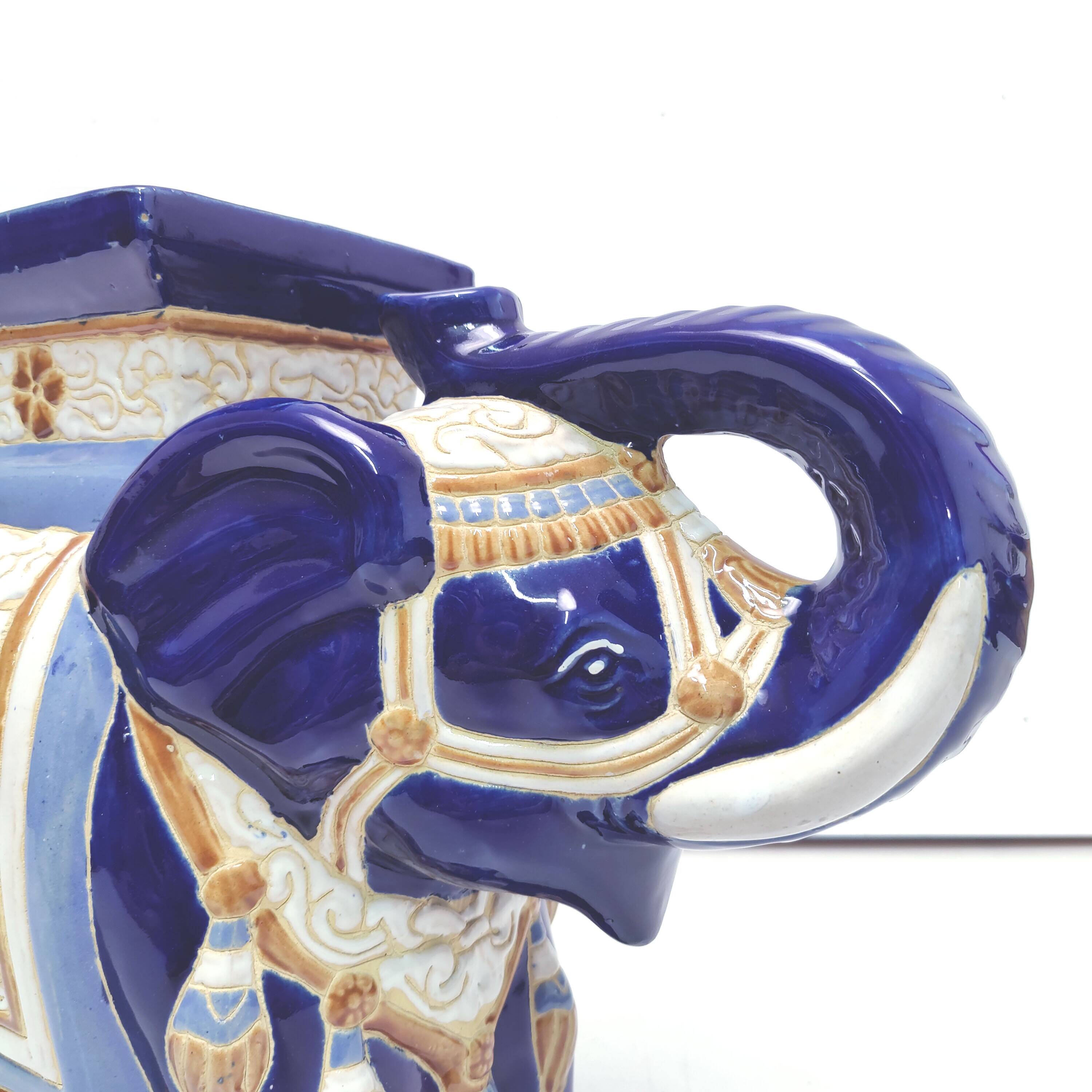 Large ceramic elephant blue plant holder