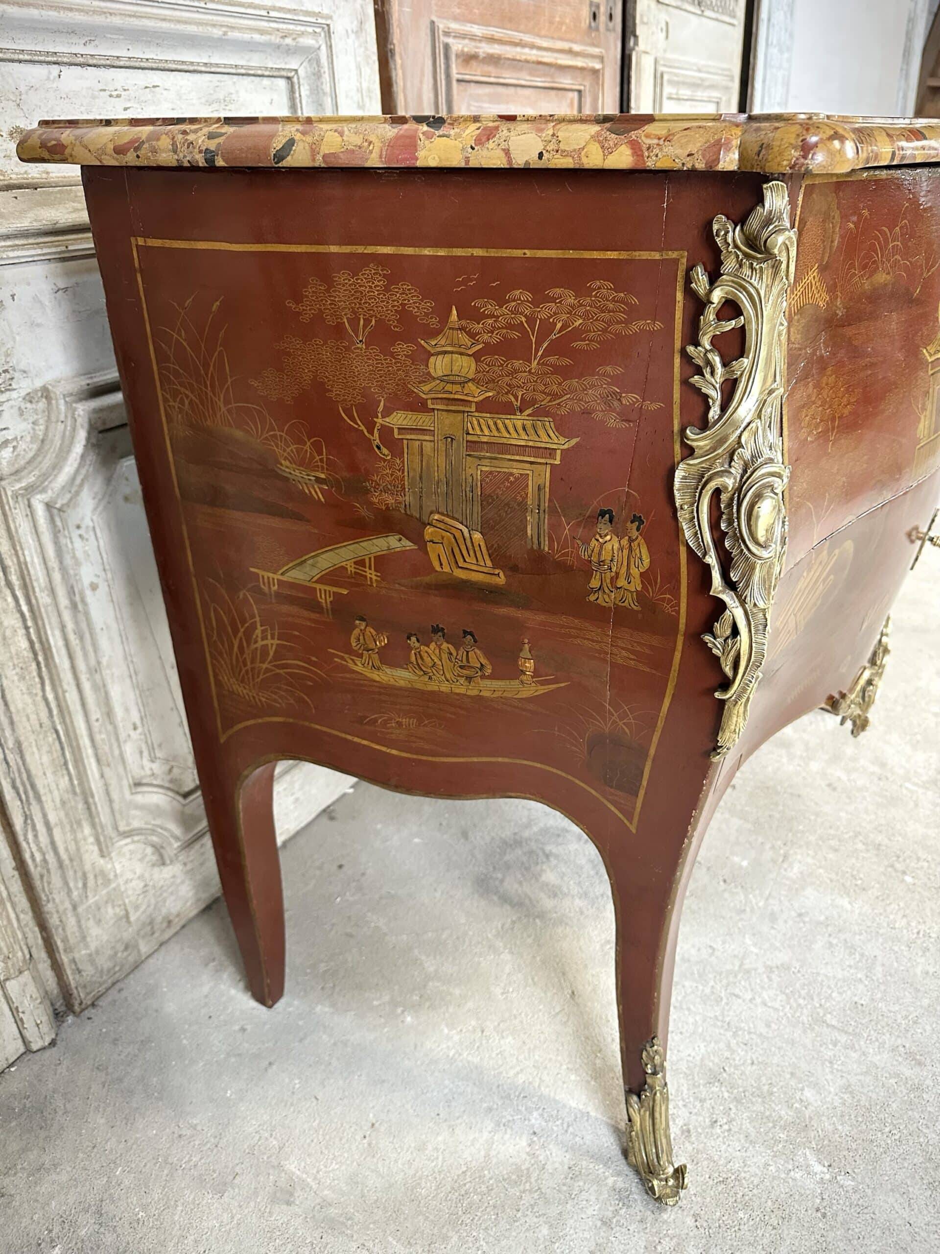 Louis XV style commode in red lacquer from the 1900s.