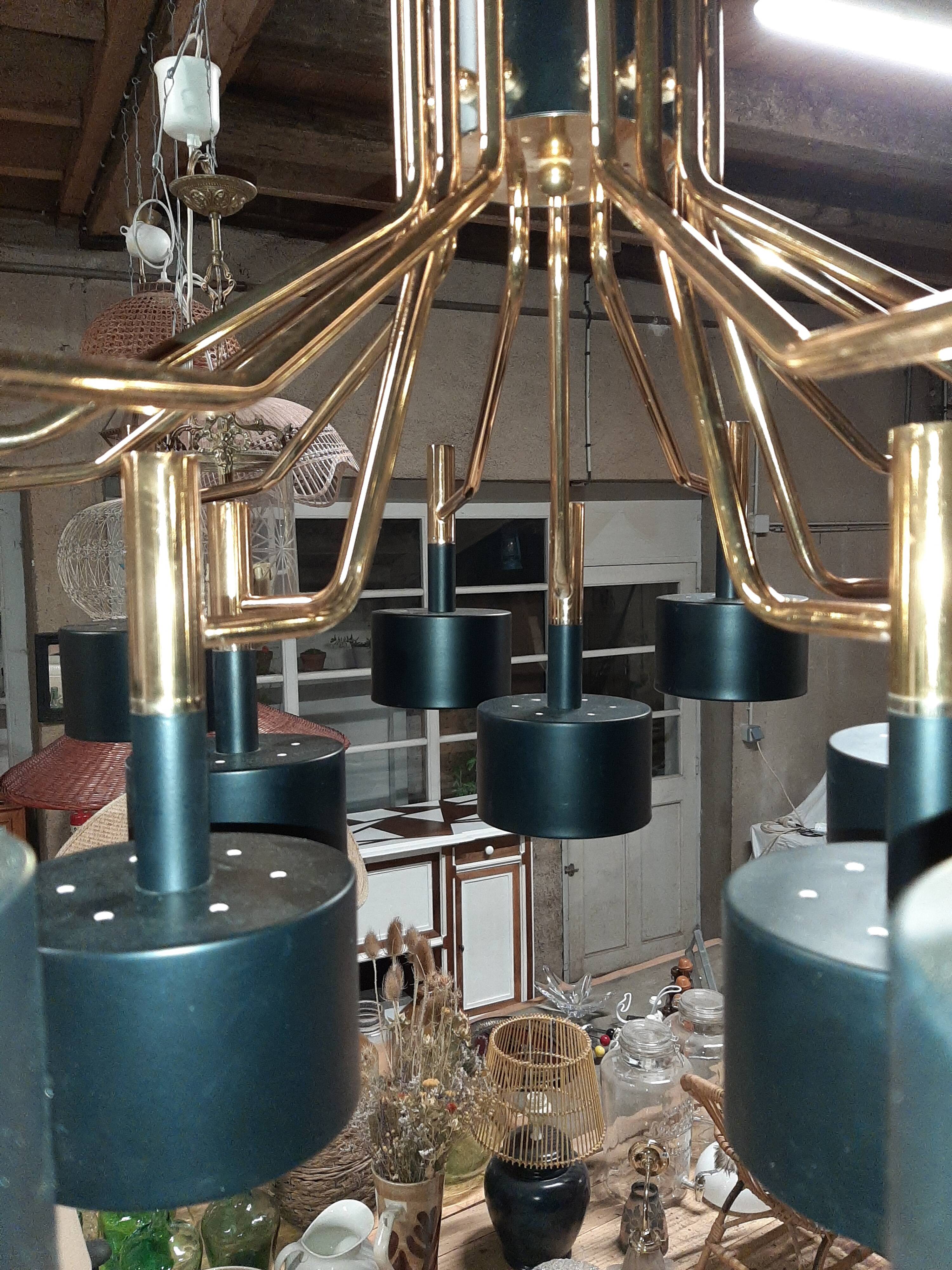 Black chandelier and gilded metal