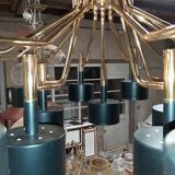 Black chandelier and gilded metal