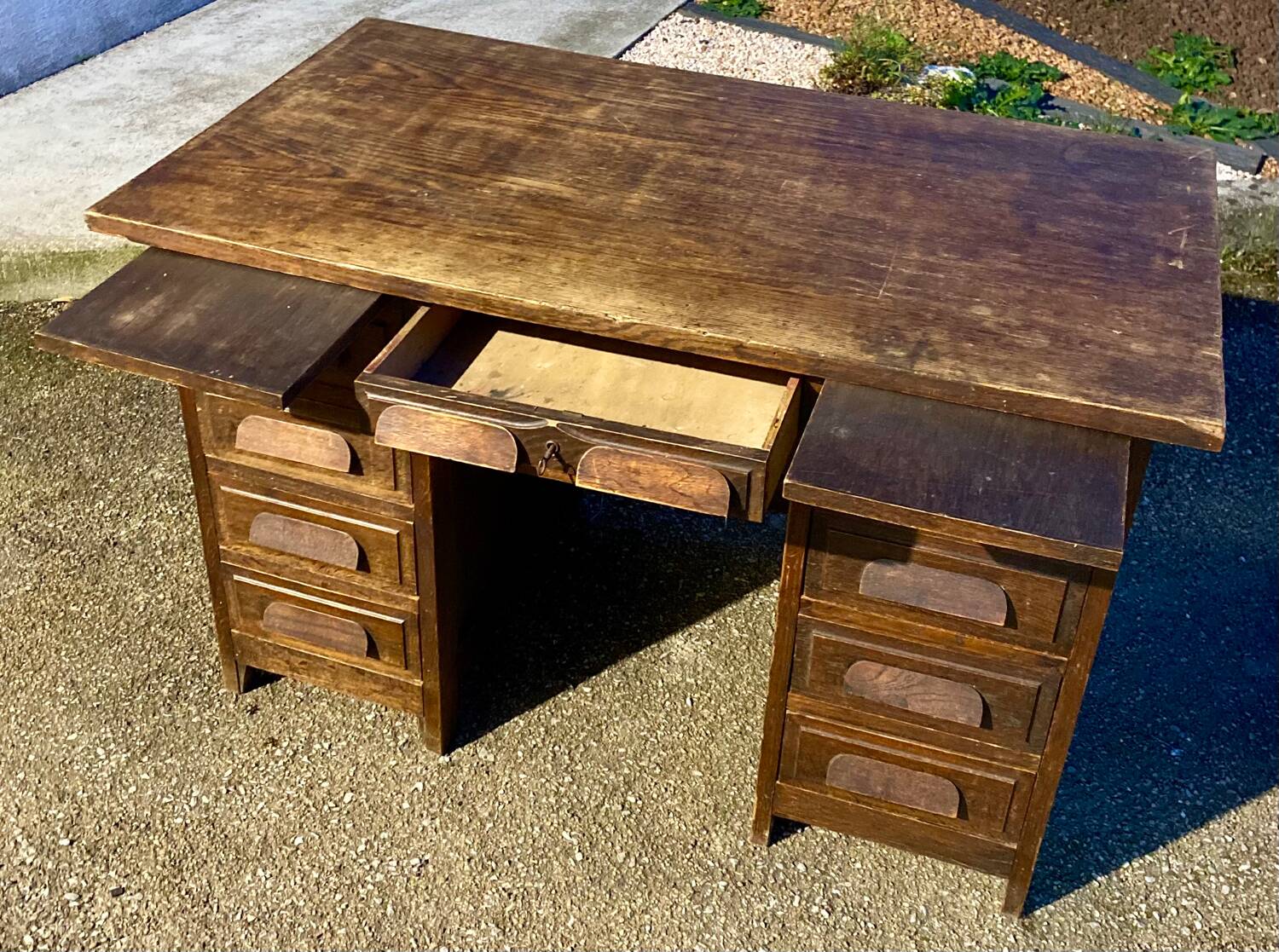 Antique American-style vintage desk with pedestal