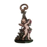 Cast iron door block cherub