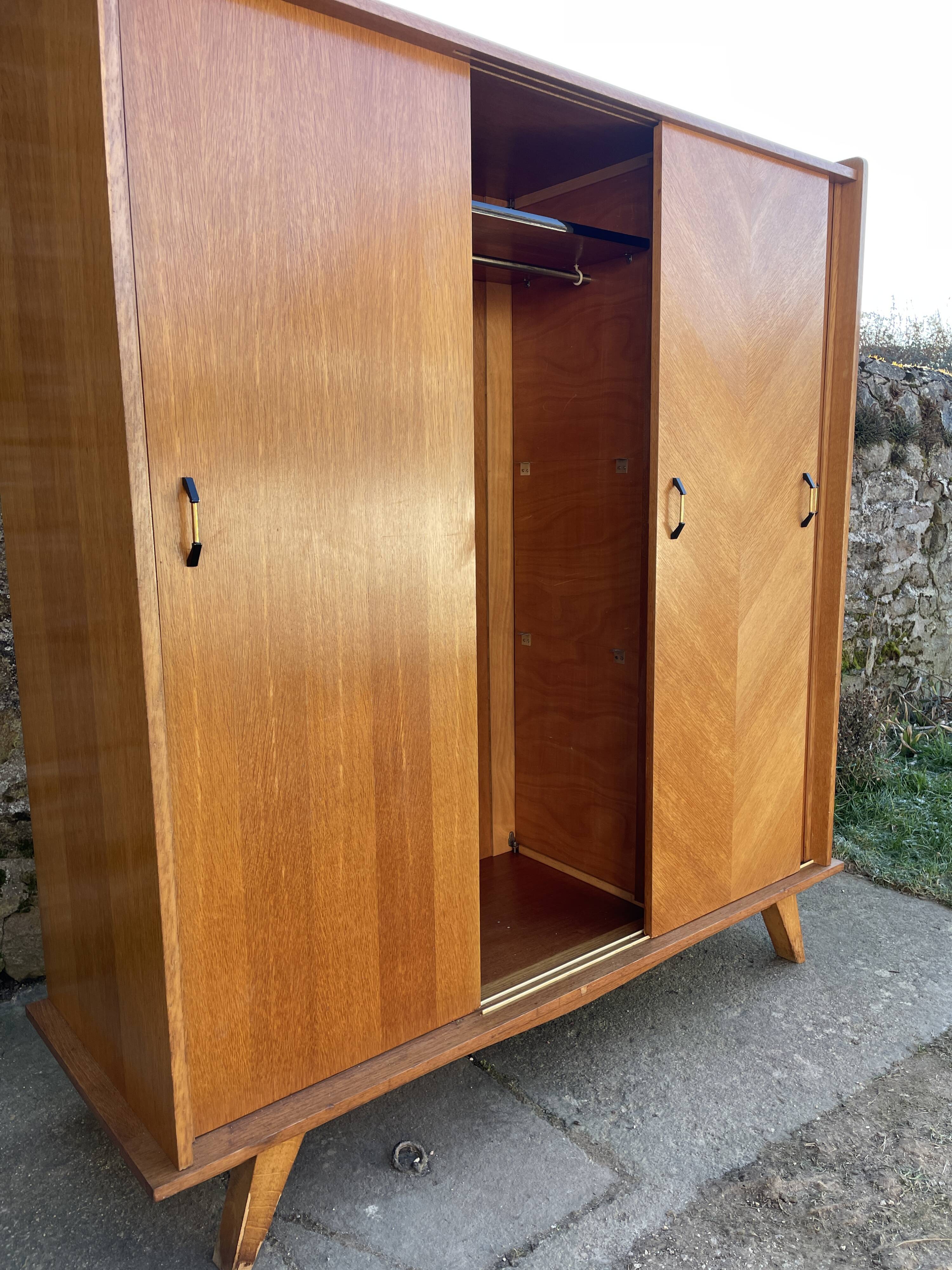 Light oak sliding door wardrobe, 1960