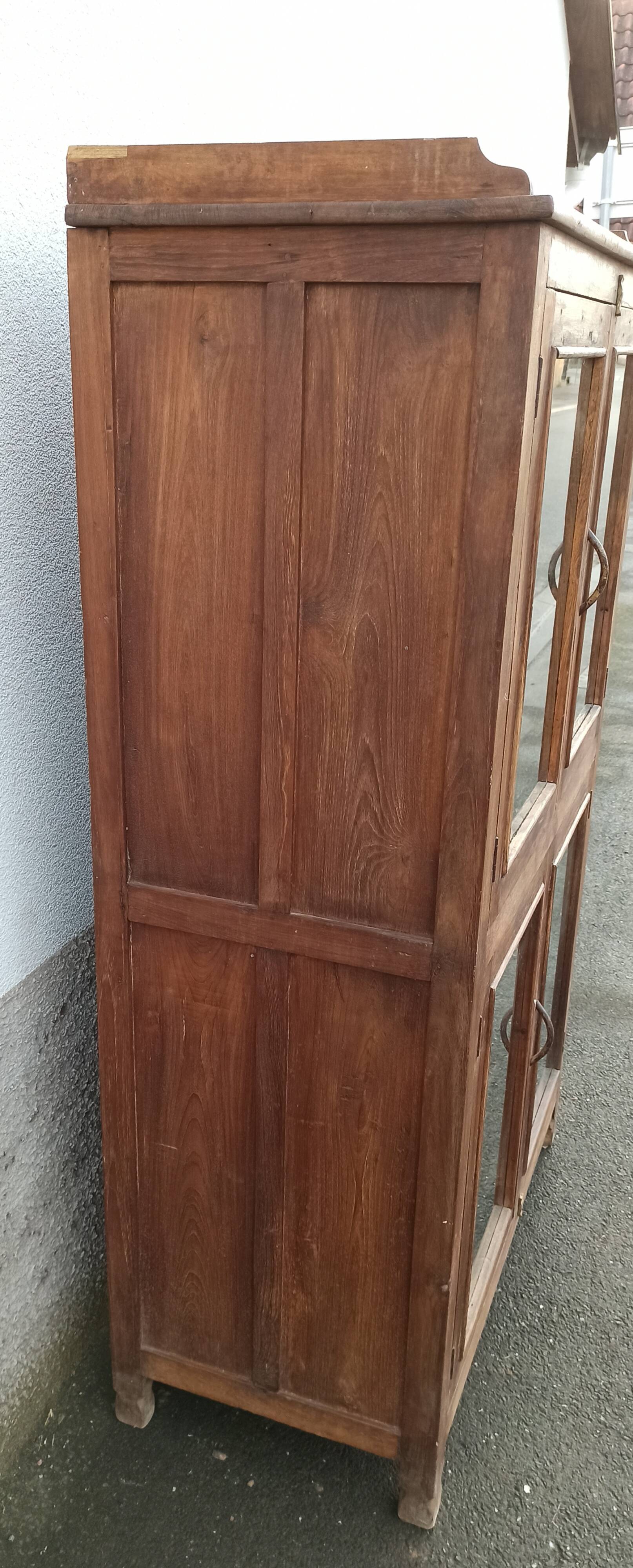 Old wooden glazed cabinet with four doors