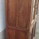 Old wooden glazed cabinet with four doors