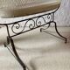 Antique rocking cradle in wrought iron