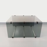 Vintage coffee table in smoked glass, black metal and cast aluminum