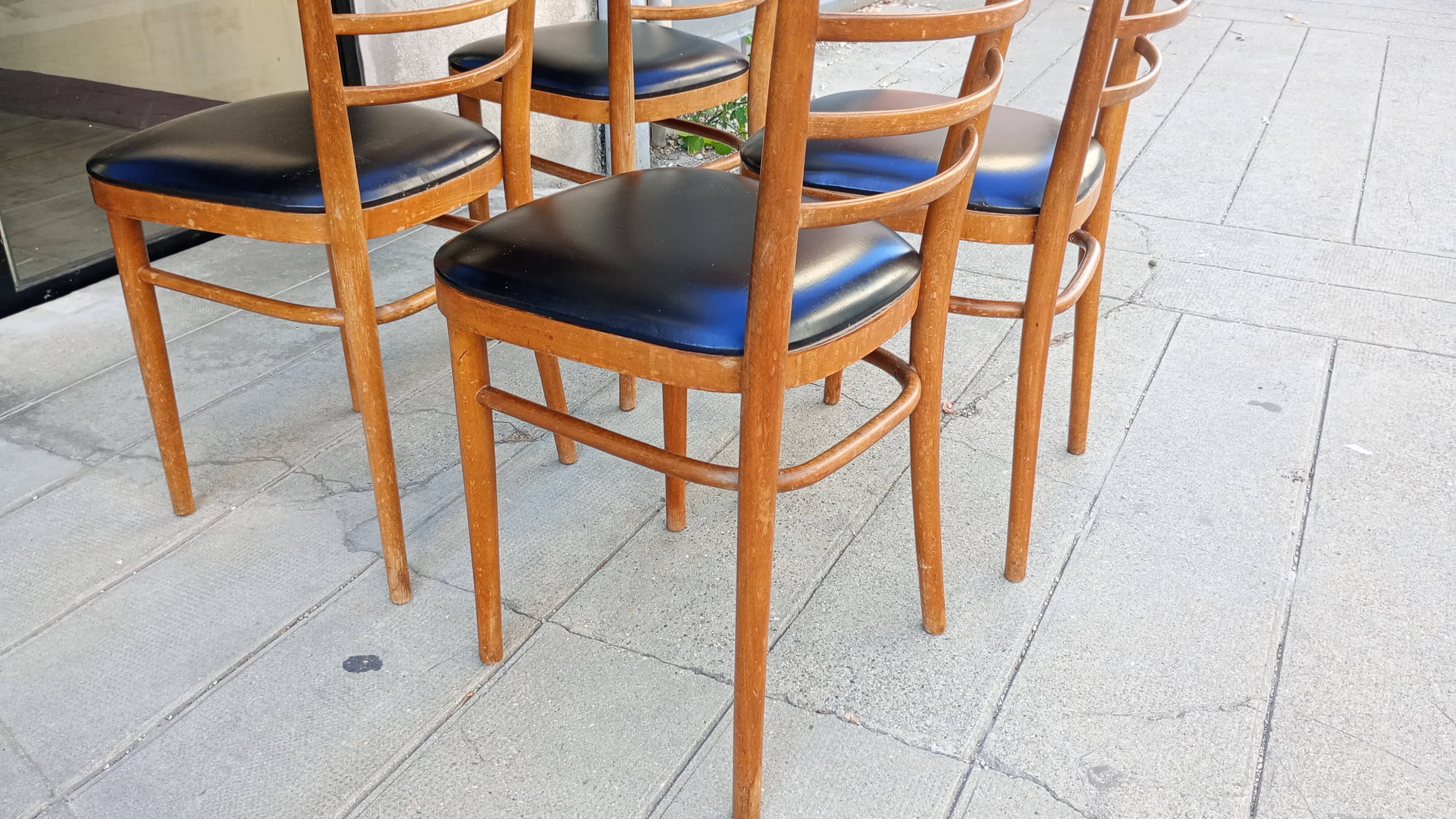 Lot of four antique chairs. Bistro. 1960.