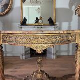 Console with 4 legs from the end of the 19th century in gilded wood in the Louis XVI style.
