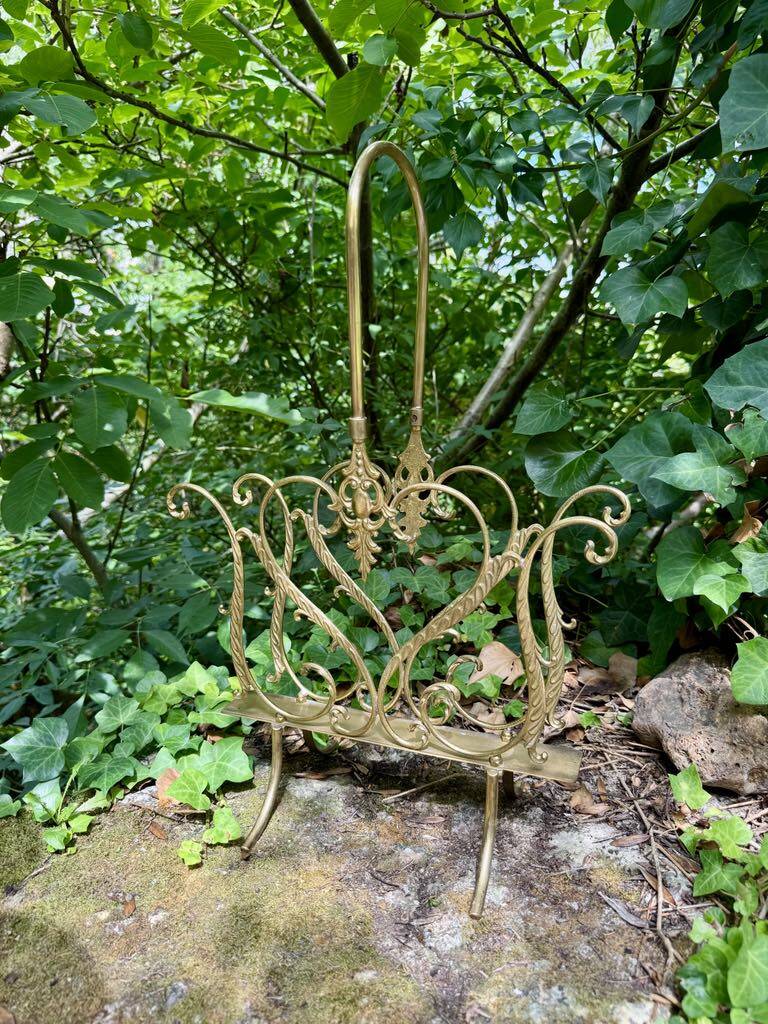 Brass magazine rack in baroque style