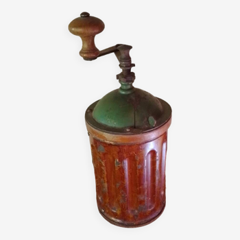 Vintage cylindrical coffee grinder in metal and wood