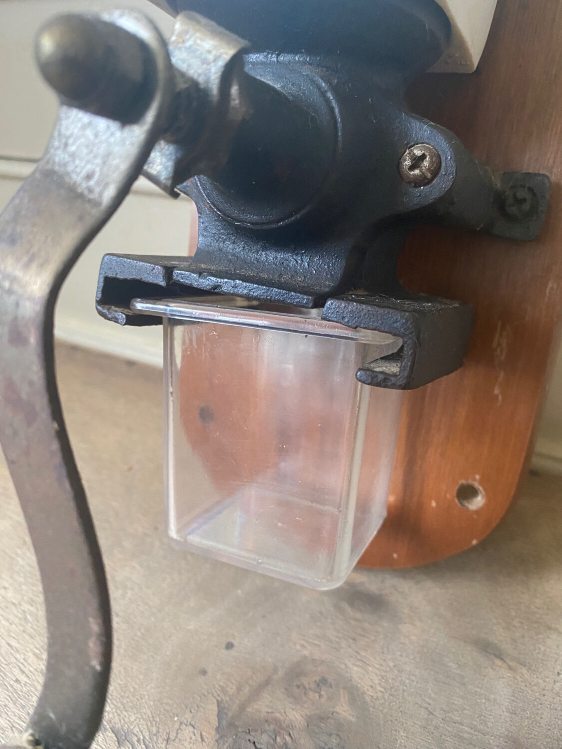 Old wall-mounted coffee grinder