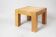 Table se salon brutaliste en bois massif