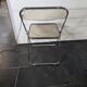 Folding office chair in smoked plexiglass by Giancarlo Piretti, Castelli edition