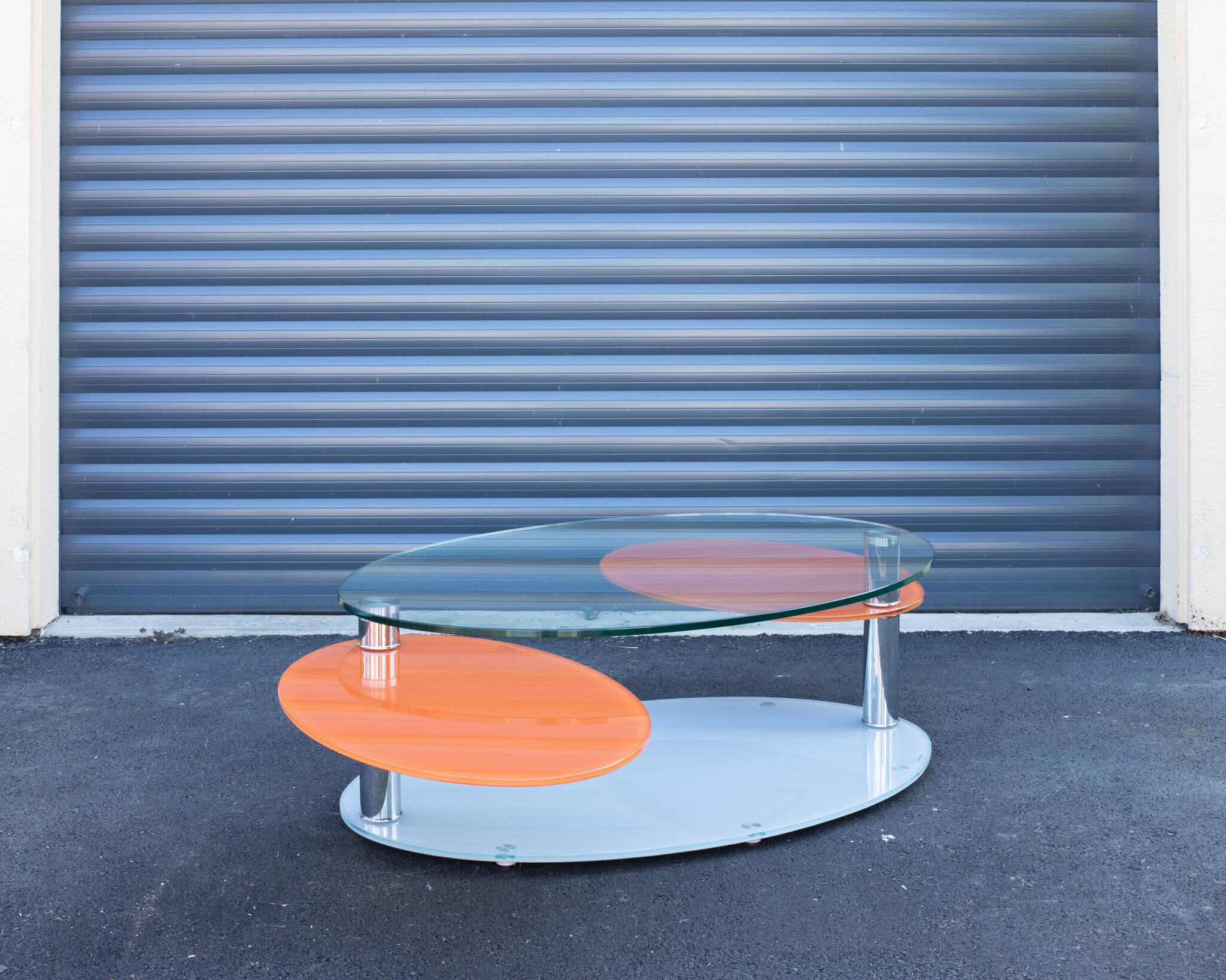 Antoine Motard designer swivel tempered glass coffee table