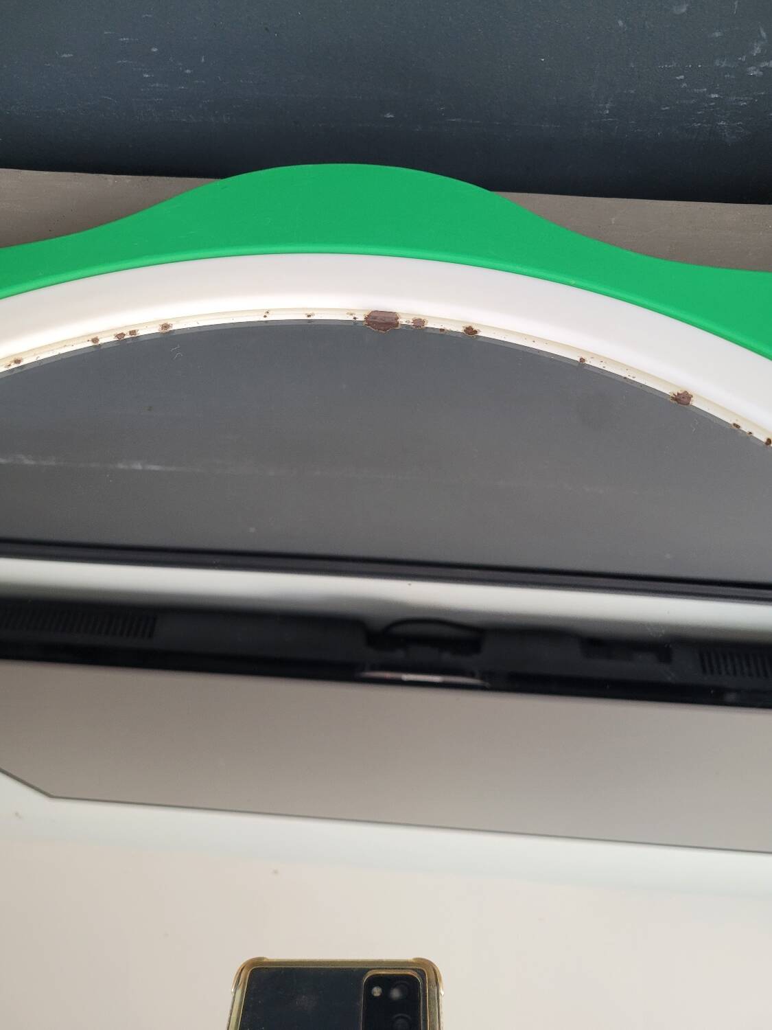 Plastic flower mirror by Finnish designer Makisen Kuvastin