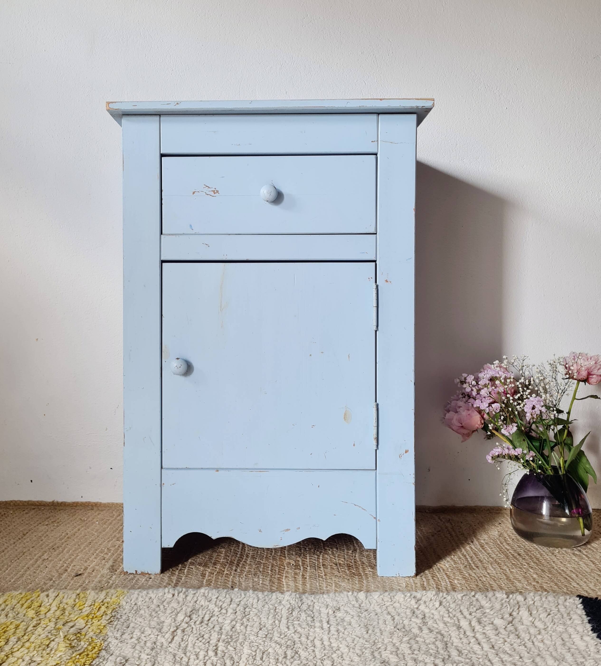 Handcrafted blue chest of drawers.