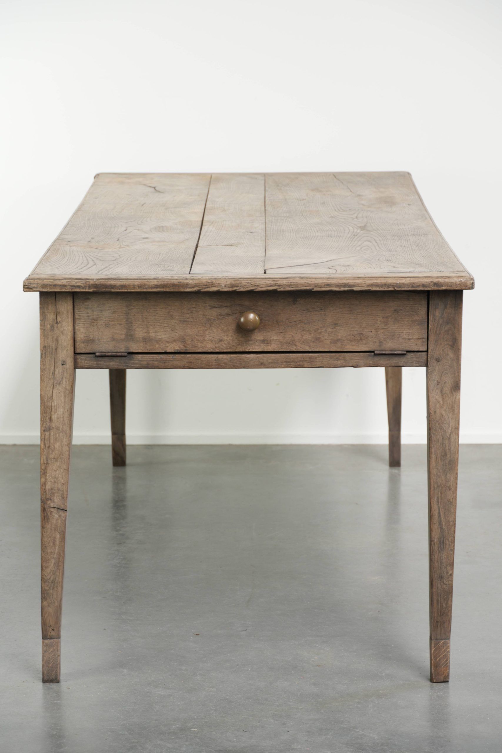 Antique French oak dining table for 6 to 8 people with a baguette drawer