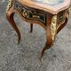 Louis XV style side table with marquetry and gilded bronze.