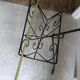 Vintage wrought iron magazine rack