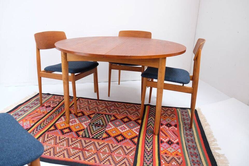 1960s/70s-style teak dining table by ASKO, with a retro vintage design.