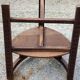 Set of three brutalist tripod armchairs in carved solid oak