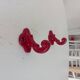 Pair of vintage wall hooks in enamelled cast iron.