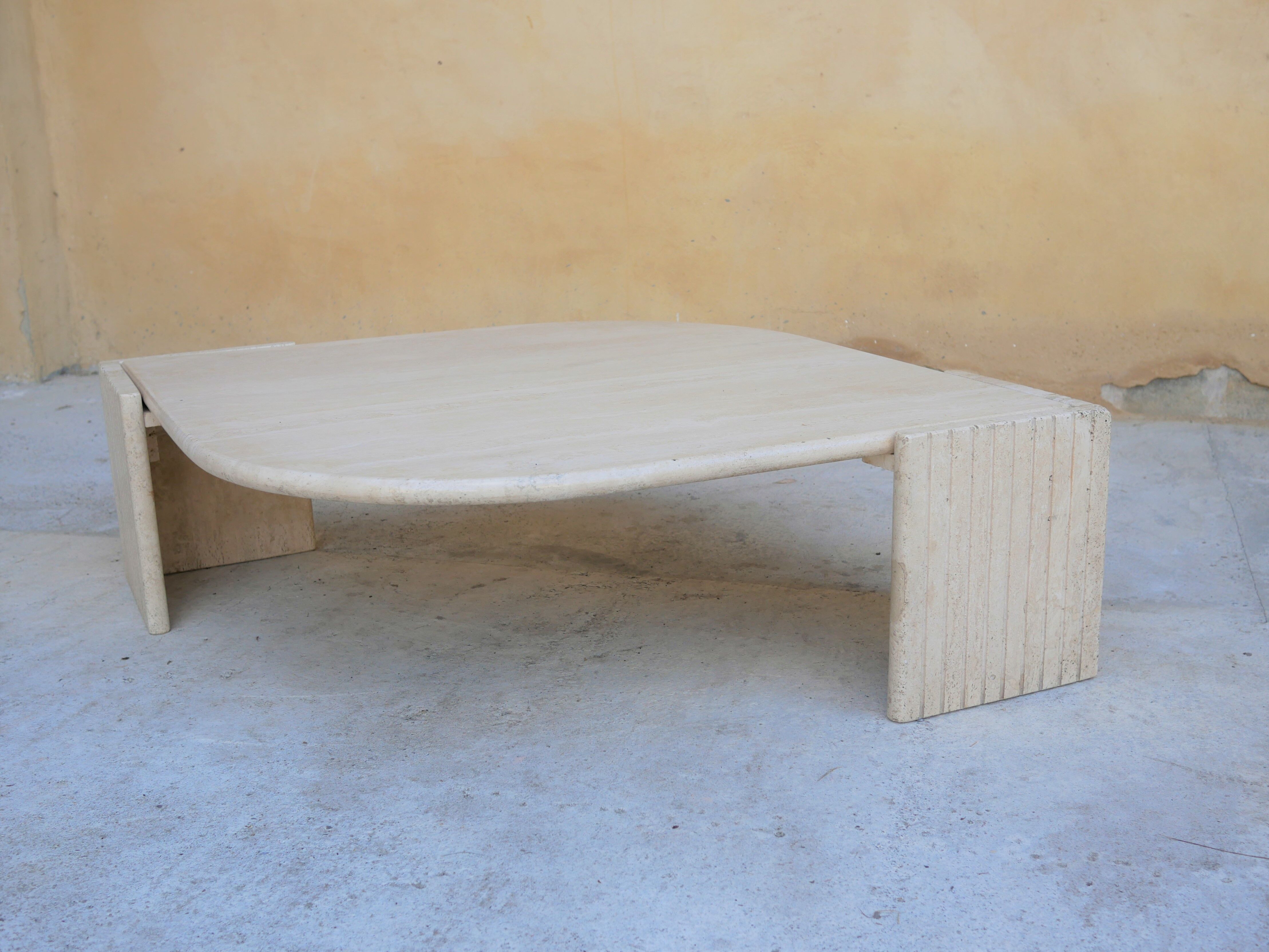Coffee table in travertine by Roche Bobois editions