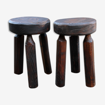 Tripod pair of dark stools