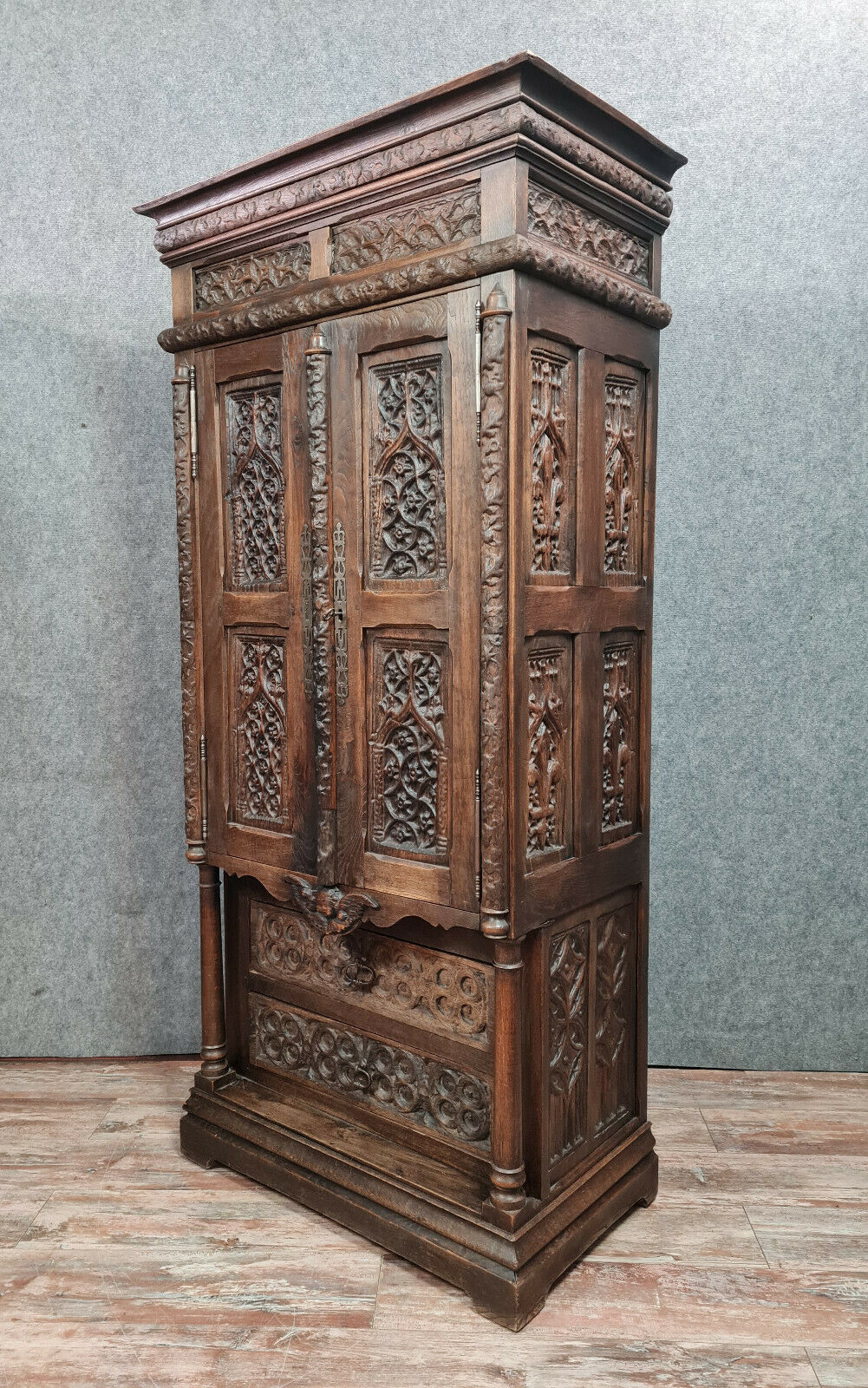 Gothic Renaissance style cabinet with solid oak putto around 1850