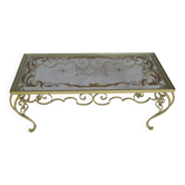 Glass and wrought iron coffee table. 1950s/1960s