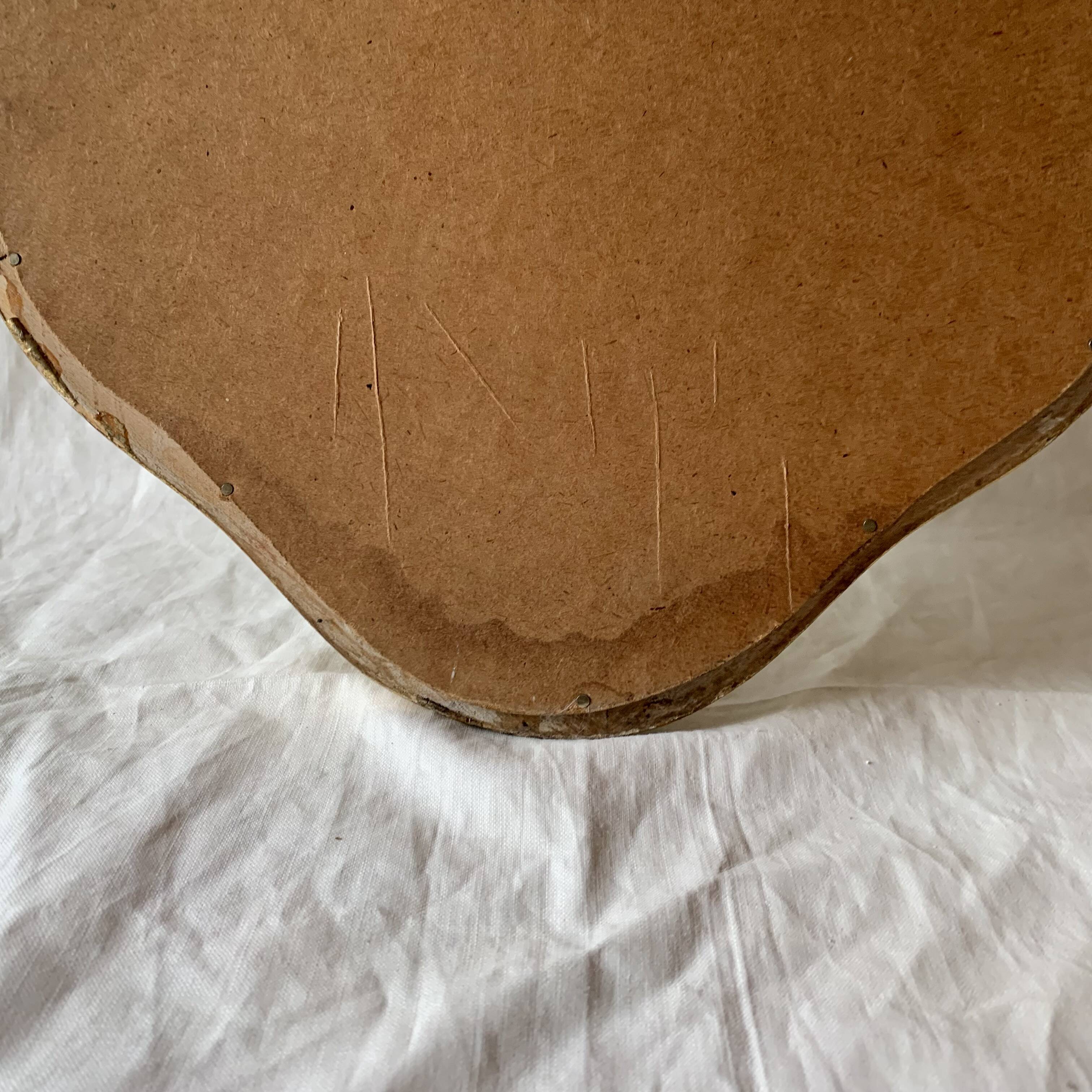 Antique beveled wall mirror in gilded solid wood