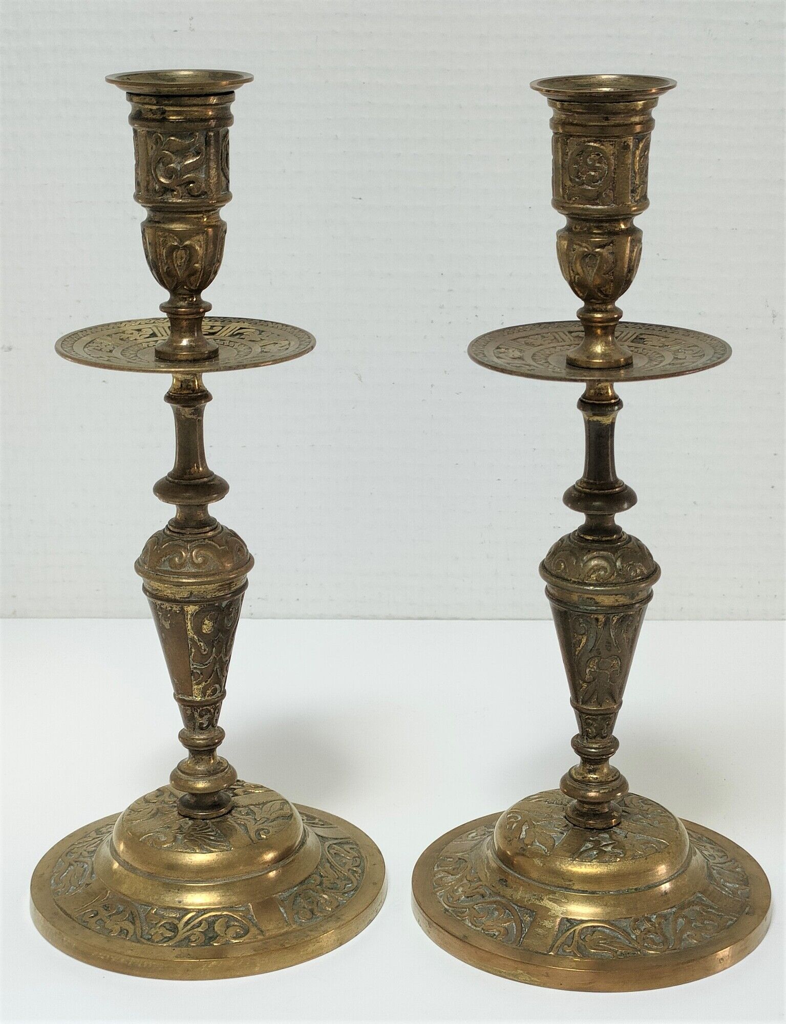 Pair of candle holders patinated bronze floral decoration early twentieth century